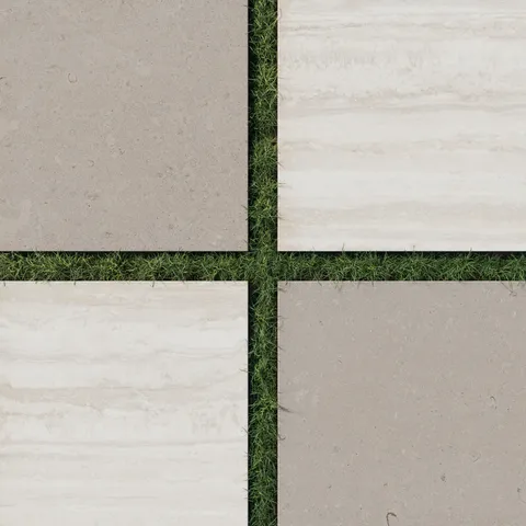 Large format porcelain pavers in beige and light brown set in grass, showcasing a warm stone look checkerboard with natural texture and modern scale.