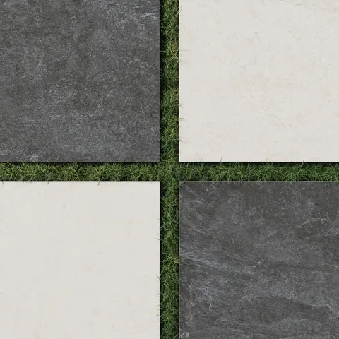 Outdoor layout with 24x24 checkerboard grip porcelain paver tile in 2cm thick dark gray and light cream tones set over natural green grass