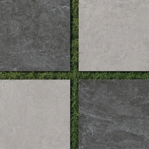 Modern checkerboard outdoor layout featuring 24x24 grip porcelain paver tile in 2cm thick dark gray and medium gray tones set over green grass