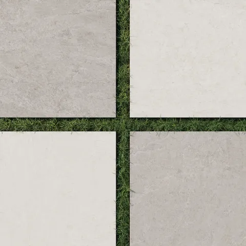 Checkerboard outdoor patio featuring 24x24 stone-look porcelain pavers in beige and gray with 2cm thickness and slip-resistant grip finish