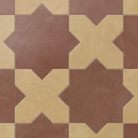Red star forms and yellow-orange crosses repeat across this porcelain tile layout, finished with a soft matte glaze and subtle cement-plaster texture that feels organic and gently handcrafted.