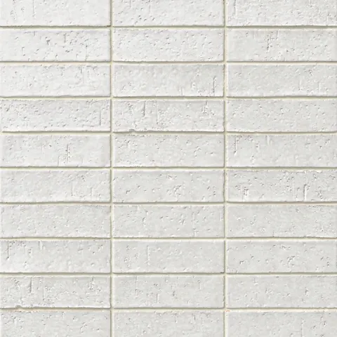 Handmade brick tiles with a gleaming grayish-white glaze, subtle dimples, pinholes, and organic surface variation.