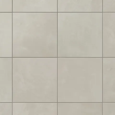 Light gray porcelain 6x6 square tiles show soft, earth-drawn color movement and a powdery matte glaze, creating a calm, balanced surface for bathrooms and kitchens.