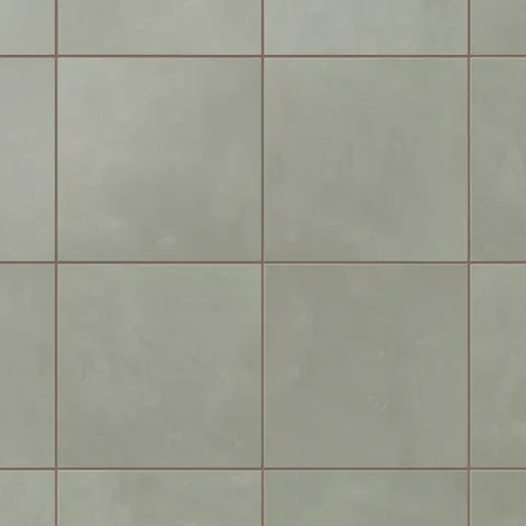 6x6 sage green porcelain tiles show soft, cloudy variation across each square, with warm grout lines adding gentle contrast and a calm, grounded feel.