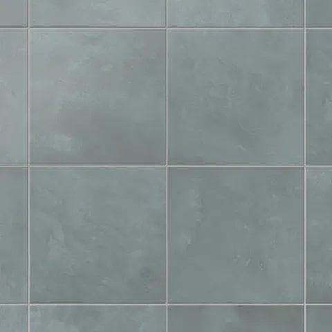 Square 6x6 porcelain tiles in blue gray show subtle shade shifts and light grout lines, giving the surface quiet depth and an easy, balanced look.