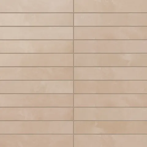 A modern porcelain subway tile in beige with soft pink undertones features quiet surface variation and a powdery matte glaze, fitting naturally into romantic or Mediterranean spaces.