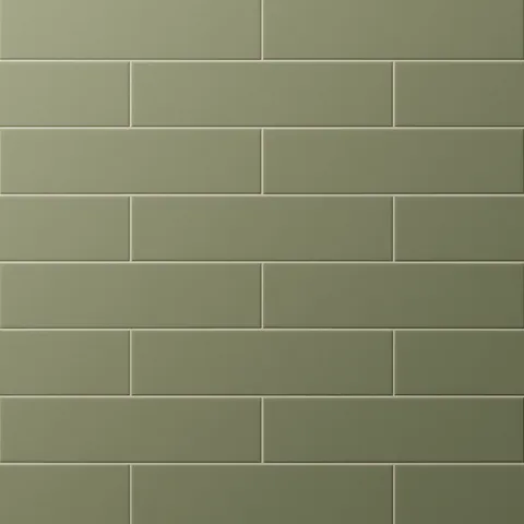 Dark green subway tiles in a classic offset pattern, offering a calm, contemporary look for walls or backsplashes.
