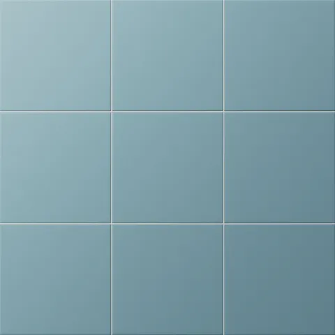 Matte earthy blue square tiles offer a soft, serene touch—perfect for spa-inspired, coastal, or playful bathroom designs.
