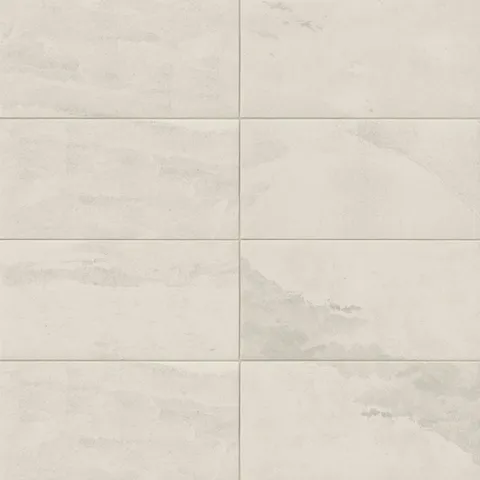 Matte rectangular tile in off-white and soft beige tones with delicate stone-like movement, ideal for creating bright, airy interiors with a timeless and natural feel.