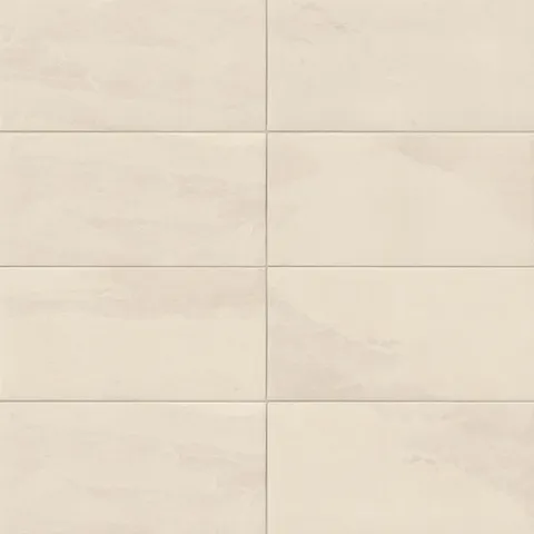 Matte rectangular tile in beige tones with subtle stone-inspired veining, perfect for bright, inviting interiors in kitchens, bathrooms, or open living areas.