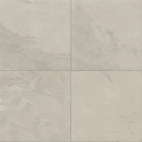 Large-format matte tile in earthy gray tones with natural stone look, offering a warm, neutral base ideal for modern, transitional, or rustic interior designs.