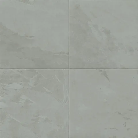 Large-format matte tile in gray and soft blue tones with stone-inspired veining, ideal for creating a calming, natural look in bathrooms, kitchens, or living spaces.