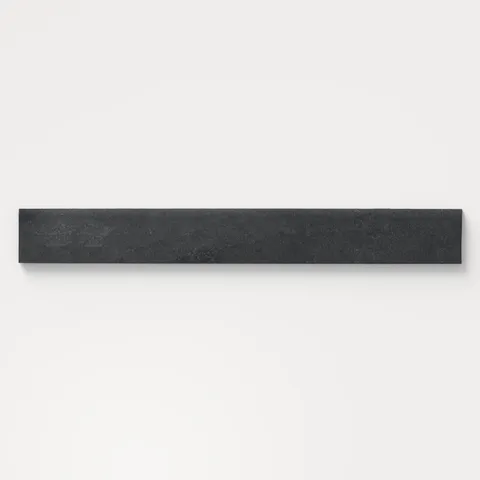 Matte stone-look bullnose tile in black and dark gray tones , ideal for clean finishing edges on walls, backsplashes, or shower surrounds with a modern, seamless touch.