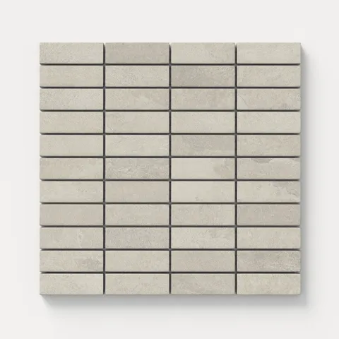 Textured matte mosaic subway tiles in earthy gray tones with a natural stone appearance, perfect for adding warmth and subtle texture to walls or backsplashes.