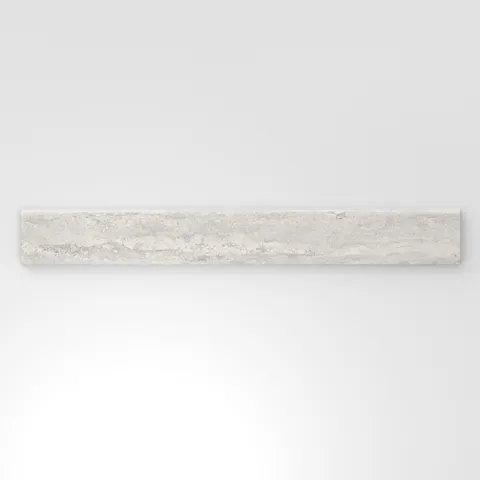 Light gray travertine-look porcelain 3x24 matte bullnose tile with delicate stone texture, subtle veining, and a rounded edge.