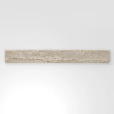 Neutral beige travertine-look porcelain 3x24 matte bullnose tile showcasing balanced tonal variation and a smooth contoured profile.