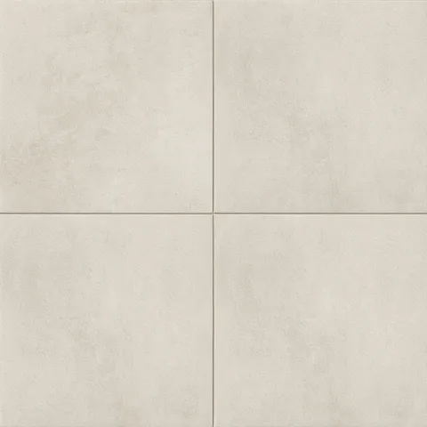 Large square tiles with a subtly textured surface and gentle shifts of grayish beige tones, echoing the traces of hand-formed clay.