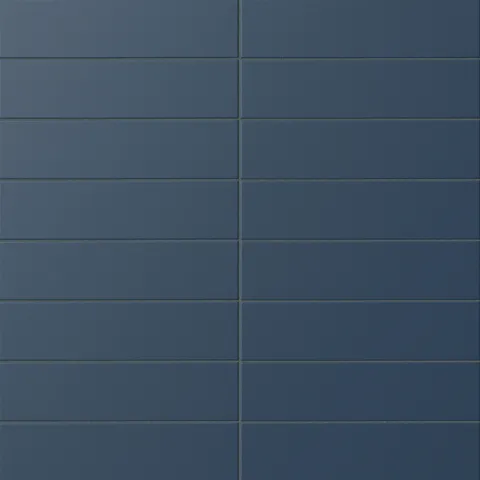 Matte subway tile in a deep midnight blue tone with a flat rectangular design, rich saturated color, subtle texture, and dark grout definition.