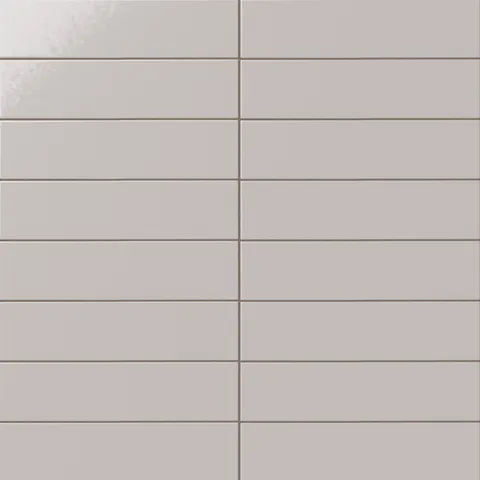 Glossy subway tile in a soft ash gray tone with a flat rectangular design, polished glaze movement, subtle tonal variation, and clean grout lines.