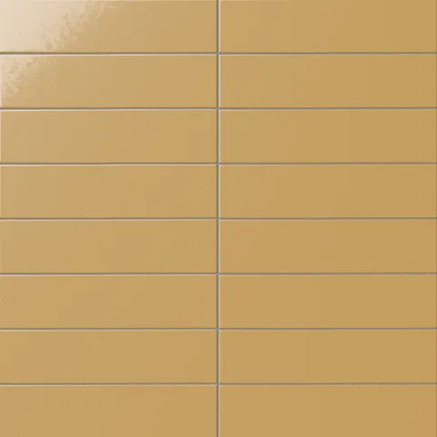 Glossy subway tile in a golden Dijon yellow tone with a flat rectangular design, luminous glaze variation, warm tonal depth, and straight stacked grout lines.