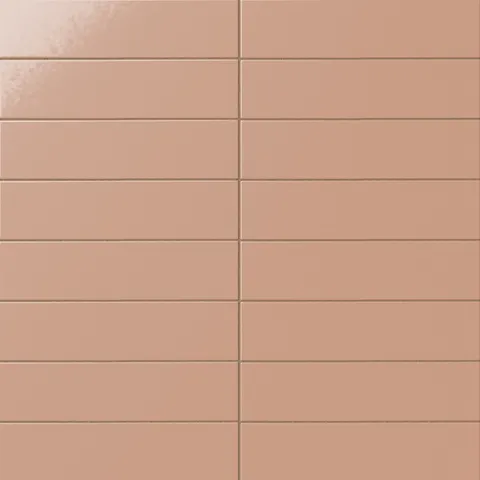 Glossy subway tile in a warm terracotta blush tone with a flat rectangular design, reflective glaze variation, earthy pink-orange color, and clean stacked grout lines.