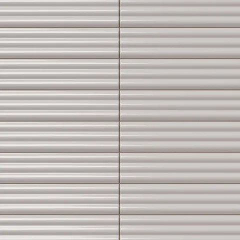 Reeded rectangular tile in a soft ash gray tone with a glossy finish, polished linear fluting, subtle glaze movement, and a sleek contemporary surface.