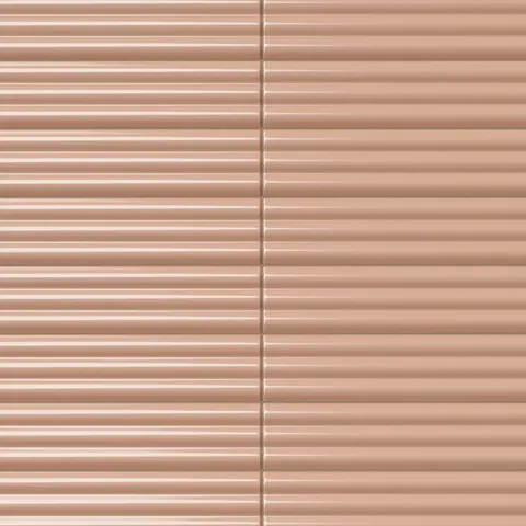 Ridged rectangular tile in a warm terracotta blush tone with a glossy finish, softened edges, horizontal linear grooves, and gentle tonal variation.