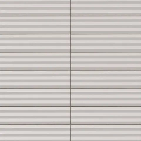 Ridged rectangular tile in a cool ash gray tone with a matte finish, soft shadowed grooves, horizontal stacked design, and understated modern texture.