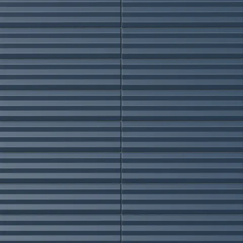 Ridged rectangular tile in a deep midnight blue tone with a matte finish, horizontal channel detailing, muted surface depth, and a refined architectural profile.