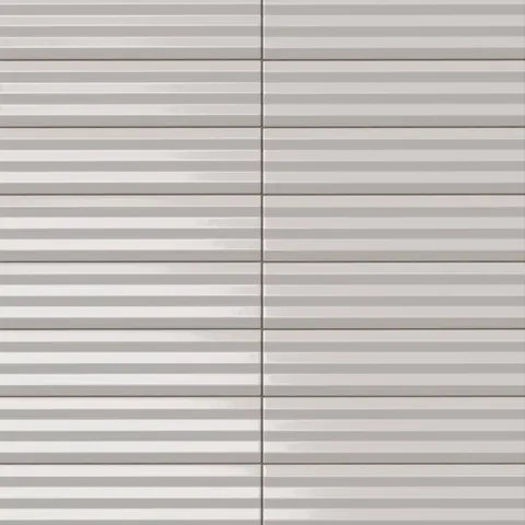 Ridged rectangular tile in a soft ash gray tone with a reflective glaze variation, horizontal ribbed detailing, and a polished contemporary look.