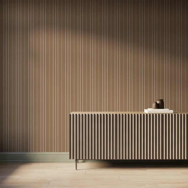 Cream beige striped wallpaper paired with a ribbed wood console cabinet and neutral decor, creating a warm modern interior scene.