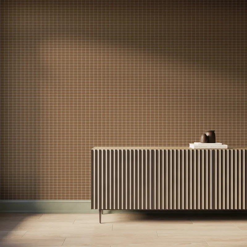 Earthy brown plaid wallpaper with off-white grid lines, styled behind a modern fluted wood console and minimal decor.