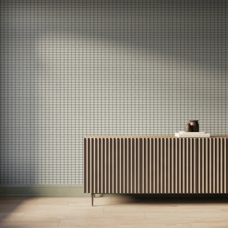 Off-white plaid wallpaper with black grid lines, styled behind a modern fluted wood console and minimal decor.