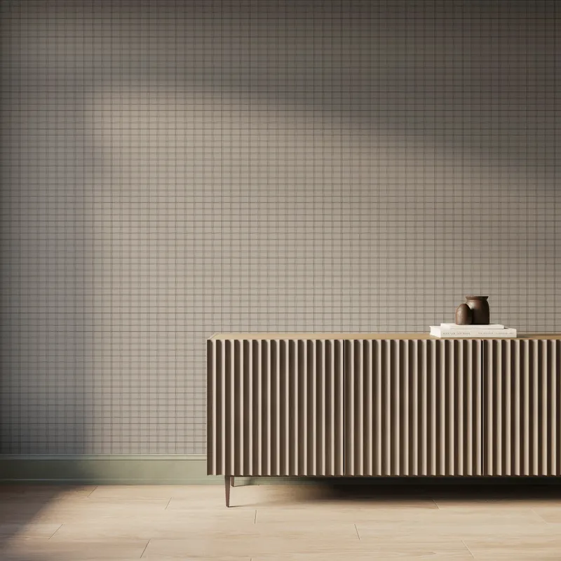 Light taupe plaid wallpaper with brown grid lines, styled behind a modern fluted wood console and minimal decor.
