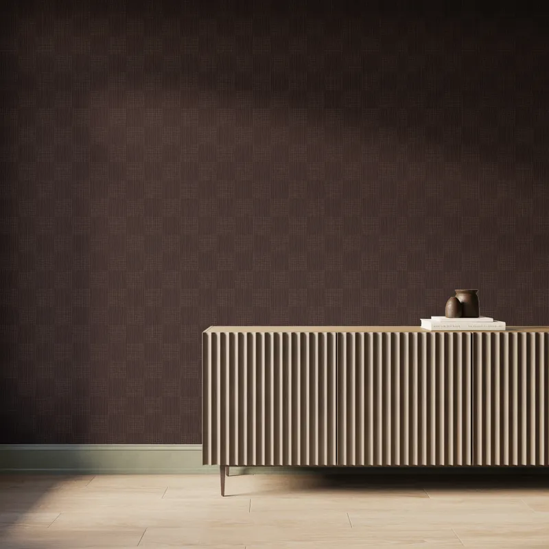 Dark brown base and fine beige woven geometric wallpaper with a subtle checker pattern, styled in a modern interior behind a fluted wood sideboard with decorative vases.