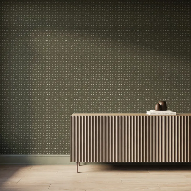 Dark green Somerset Wallpaper in Olive II with soft off-white watercolor-style motifs creates a relaxed backdrop behind a ribbed wood console.
