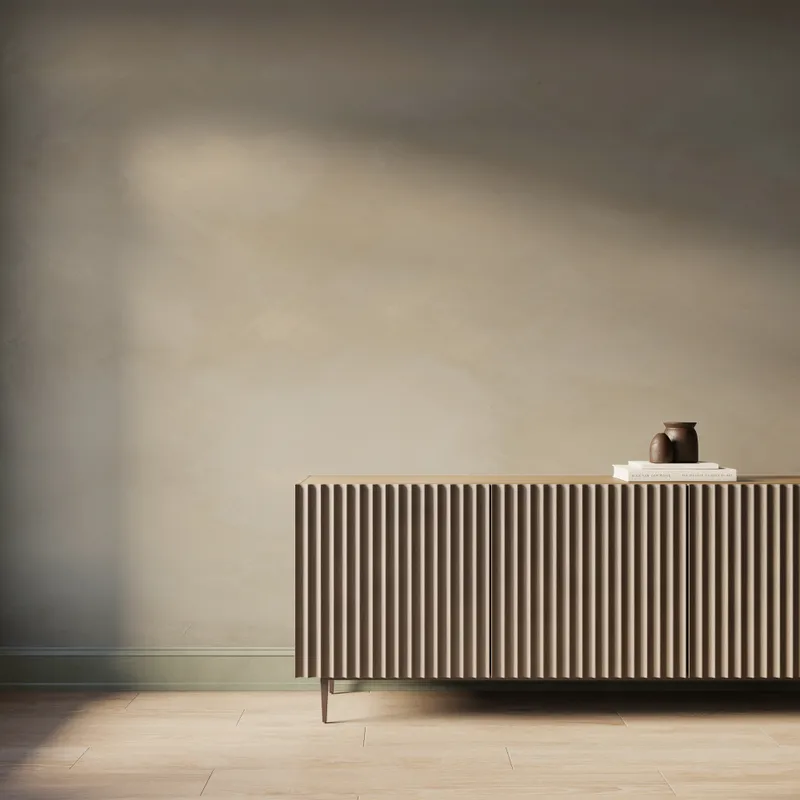 Gallery scale beige abstract limewash-look wallpaper mural with soft tonal texture, styled behind a modern fluted wood console.
