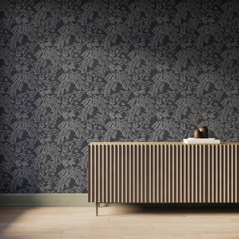 Dark gray abstract contour wallpaper with white topographic lines behind a modern ribbed wood console table.