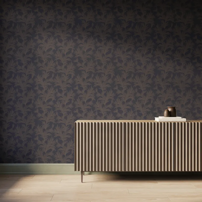 Black botanical wallpaper with repeating brown leafy branch pattern, styled behind a modern fluted wood console.