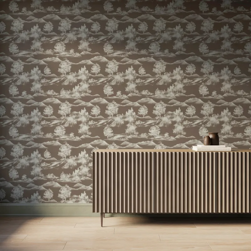 Dark taupe scenic landscape wallpaper with white trees and mountain silhouettes behind a modern ribbed wood console table.