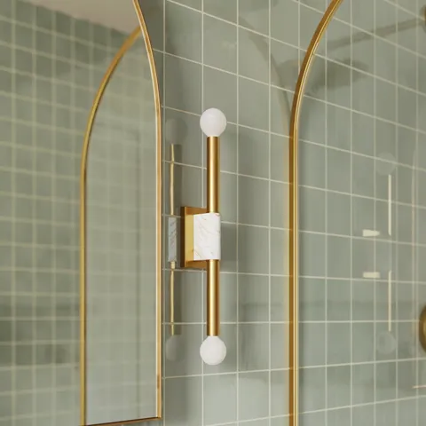 Larson Wall Sconce in Aged Brass