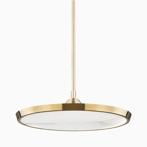 Modern round pendant light in aged brass finish with a flat circular shade, suspended by a slim rod for sleek contemporary design.