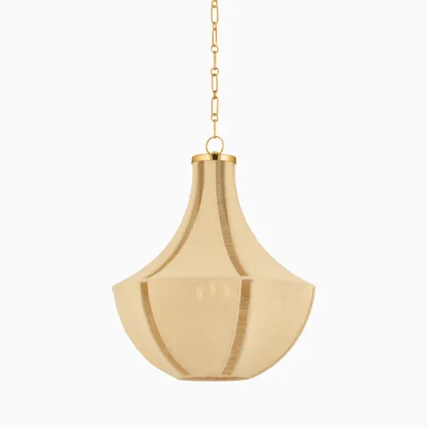 Aida pendant in aged brass with a sculptural jute shade, blending soft curves and warm tones for a refined ambient statement