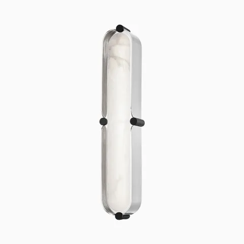 Wall sconce with burnished nickel capsule frame, dusk black accents, and frosted alabaster-style insert with LED lighting.