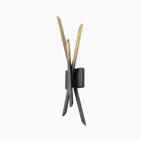 Sculptural black and gold wall sconce with intersecting angular blades creating a dramatic, modern silhouette