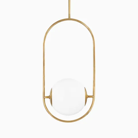 Minimalist pendant light featuring a white glass globe held within a large oval vintage brass frame suspended from a ceiling rod.