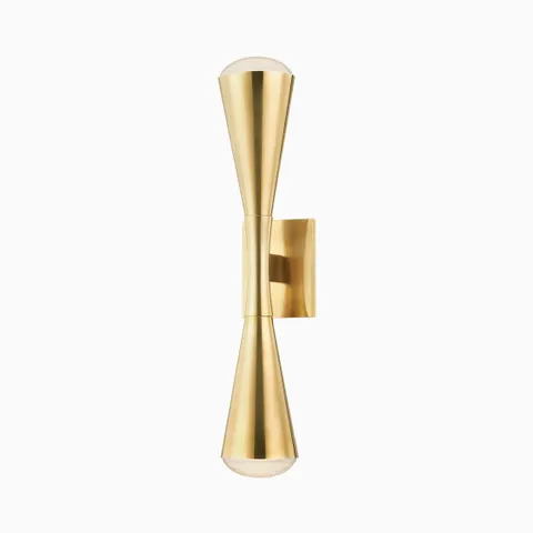 Garnet wall sconce in vintage brass with a double-cone silhouette and bubble glass ends, merging glamor with mid-century modern flair.