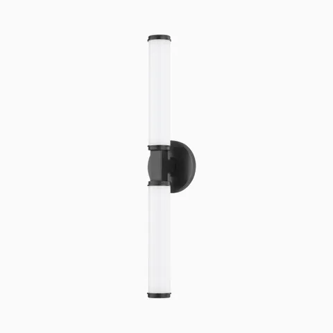 Sleek vertical wall sconce with dual cylindrical white glass cylinder lights and a central matte black mount for modern symmetry