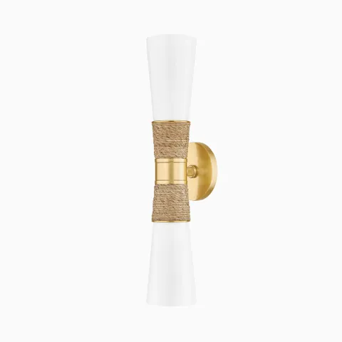 Aged brass wall sconce with woven rattan accent and dual white glass shades, offering a warm modern lighting fixture.