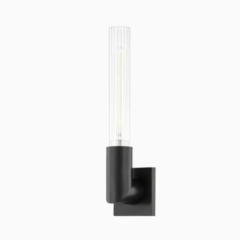 17" wall sconce with old bronze finish in black metallic tones, right-angled arm, and tall fluted glass shade for a modern accent.